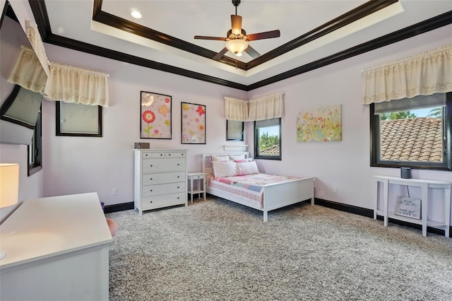 bedroom featuring recessed lighting, a raised ceiling, carpet floors, crown molding, and baseboards