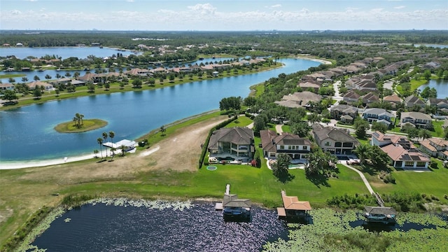 aerial view with a residential view and a water view