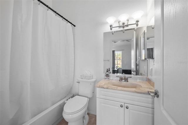 full bathroom featuring toilet, shower / bath combo with shower curtain, and vanity