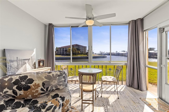 19029 US Highway 19 N Unit 7-9, Clearwater, FL 33764 - sunroom / solarium featuring a water view and ceiling fan