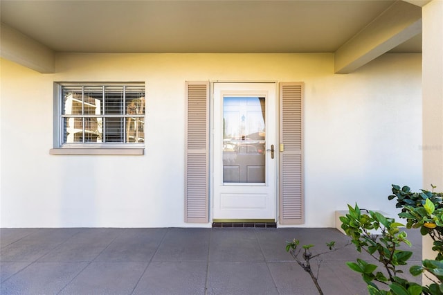 19029 US Highway 19 N Unit 7-9, Clearwater, FL 33764 - entrance to property featuring a patio and stucco siding