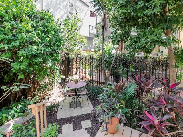 view of patio featuring fence