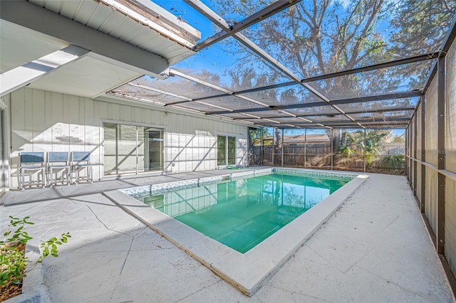 view of pool with a fenced in pool, a lanai, a fenced backyard, and a patio