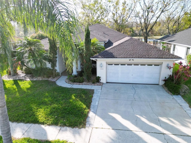 ranch-style home with roof with shingles, stucco siding, an attached garage, driveway, and a front lawn