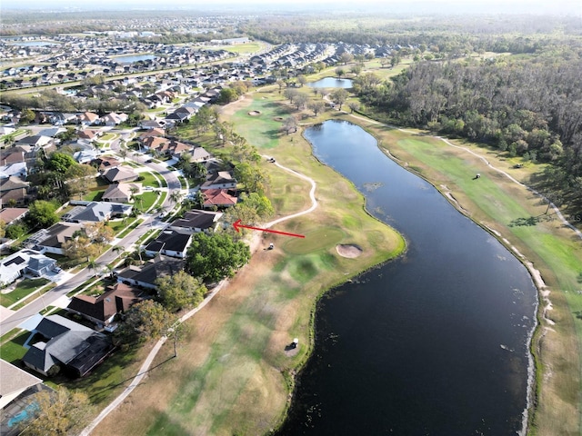 birds eye view of property with a residential view and a water view