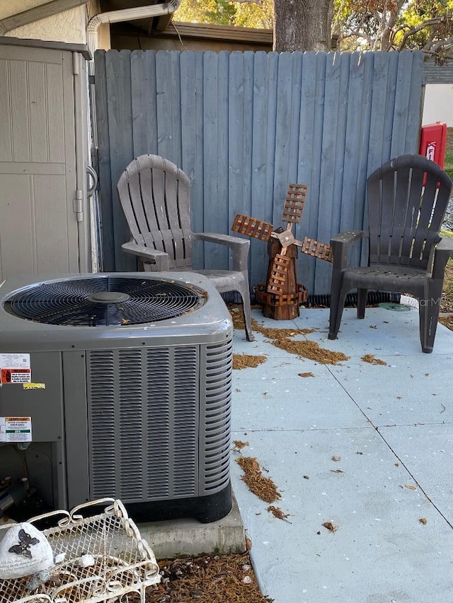 exterior details with fence and central AC