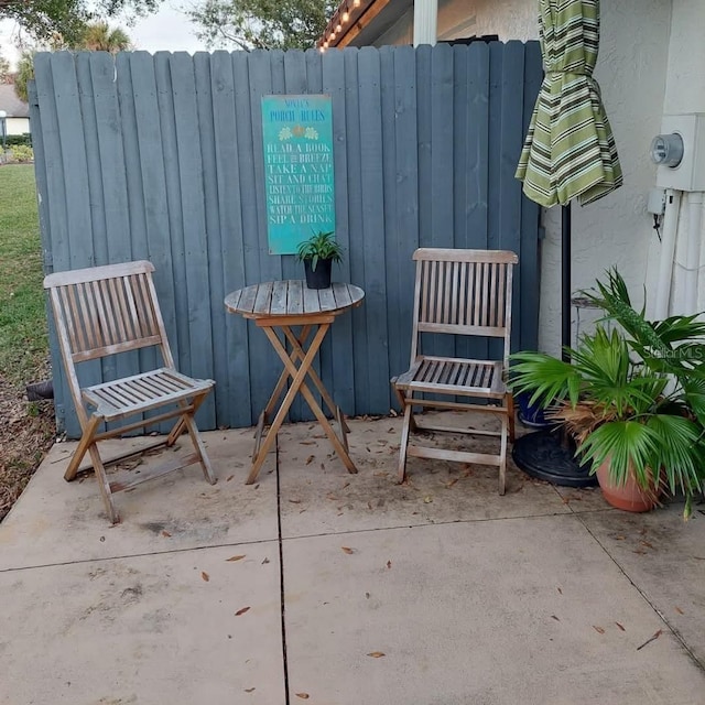 view of patio / terrace with fence