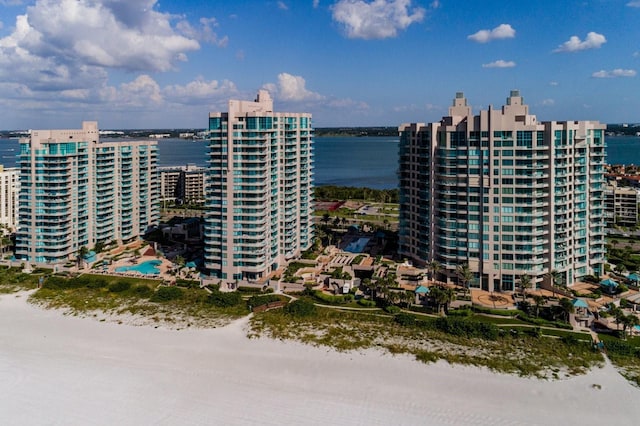 aerial view featuring a water view and a view of city