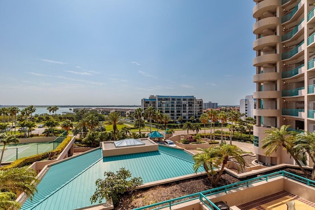 view of swimming pool featuring a city view