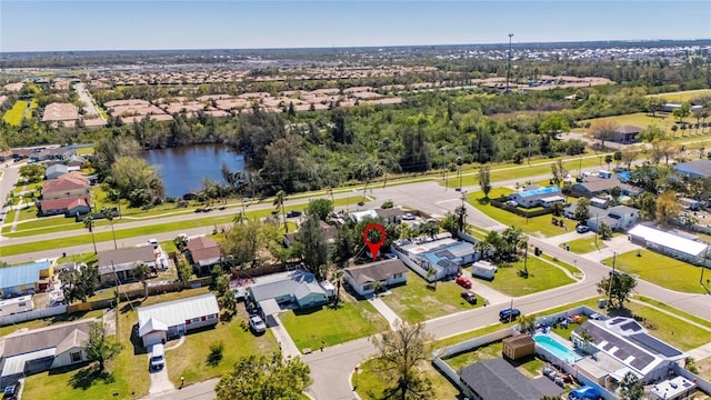 birds eye view of property featuring a residential view and a water view