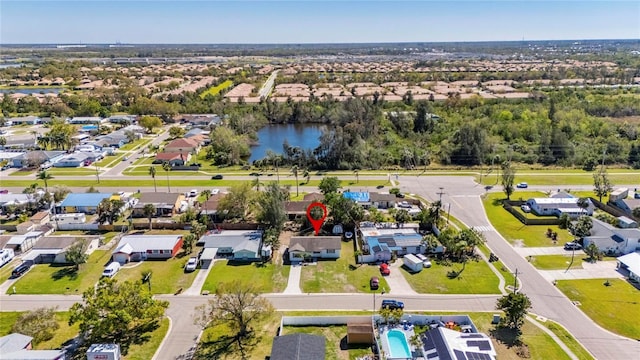 aerial view with a residential view and a water view