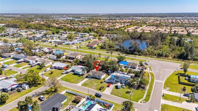 aerial view featuring a water view and a residential view