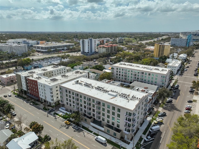 birds eye view of property with a city view