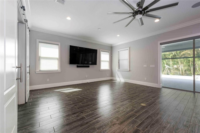 unfurnished living room with dark wood-style flooring, crown molding, baseboards, and ceiling fan