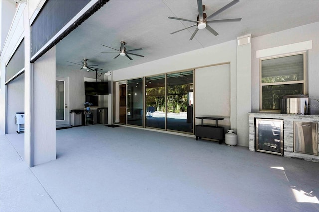 view of patio with a ceiling fan