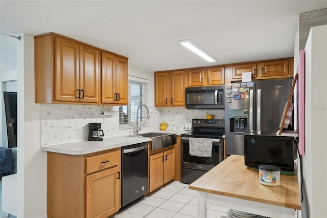 7740 Bracken Dr, Port Richey, FL 34668 - kitchen featuring light tile patterned floors, a sink, appliances with stainless steel finishes, brown cabinets, and tasteful backsplash