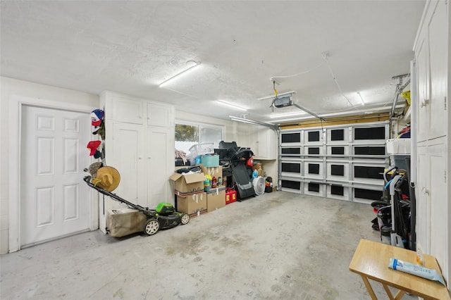 7740 Bracken Dr, Port Richey, FL 34668 - garage featuring a garage door opener