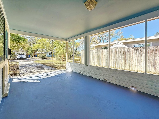 unfurnished sunroom with a healthy amount of sunlight