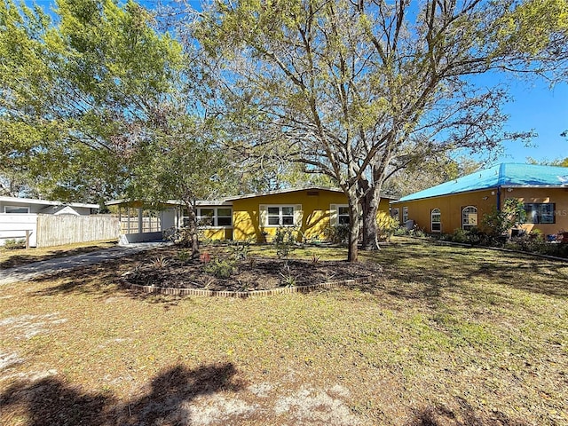 exterior space with a yard and fence