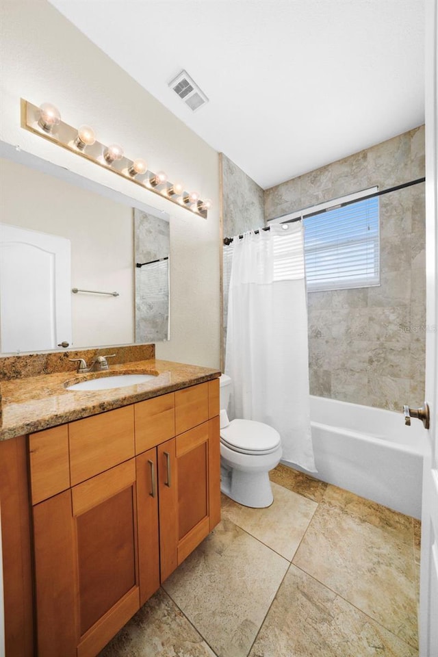 full bathroom with toilet, shower / tub combo, vanity, and visible vents