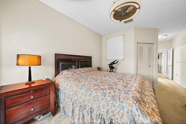 bedroom with carpet, visible vents, and baseboards