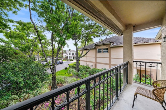 balcony featuring a residential view