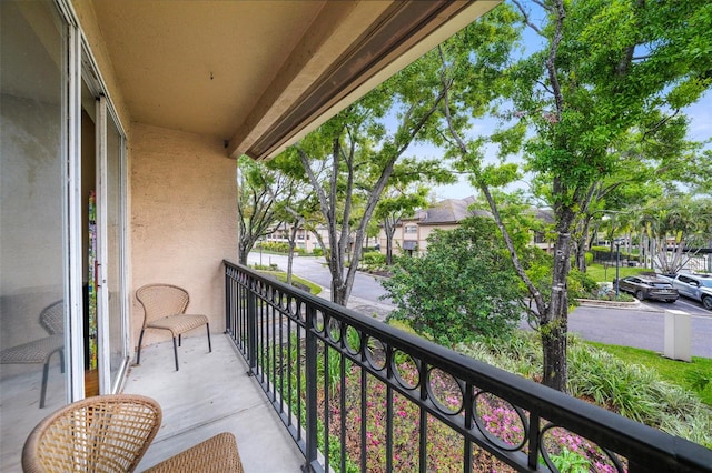 balcony featuring a residential view