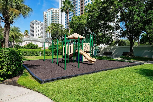 community playground featuring a yard