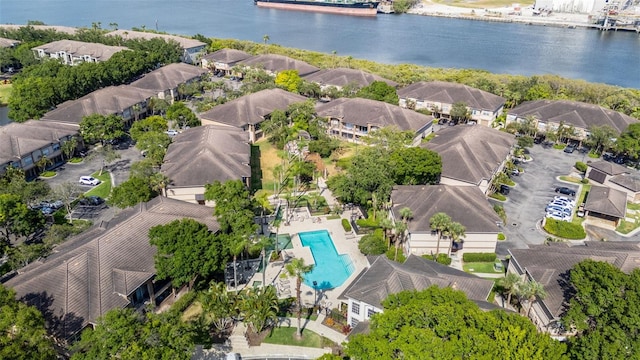 aerial view featuring a water view and a residential view