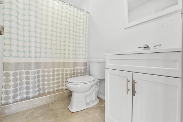 bathroom featuring vanity, a shower with shower curtain, toilet, and tile patterned flooring