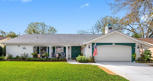 single story home with driveway, covered porch, a front lawn, a garage, and brick siding