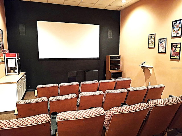 cinema room featuring recessed lighting and a paneled ceiling
