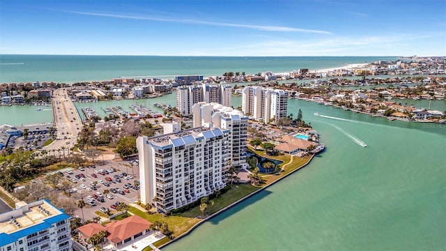 drone / aerial view featuring a view of city and a water view