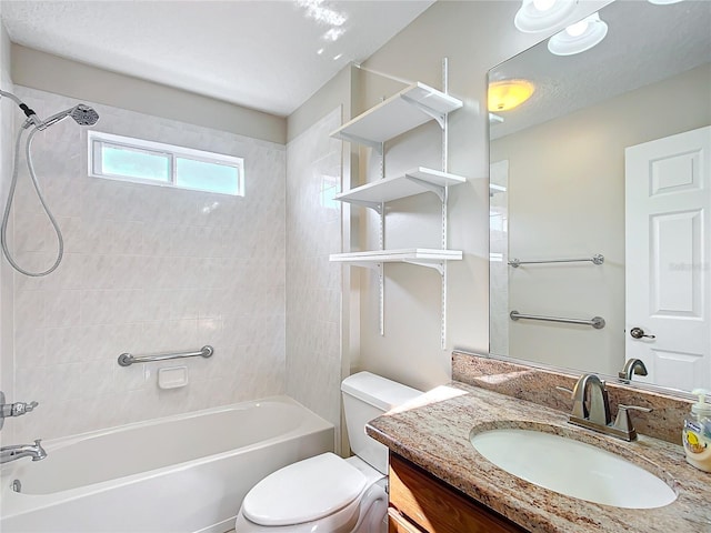 full bathroom featuring tub / shower combination, toilet, and vanity