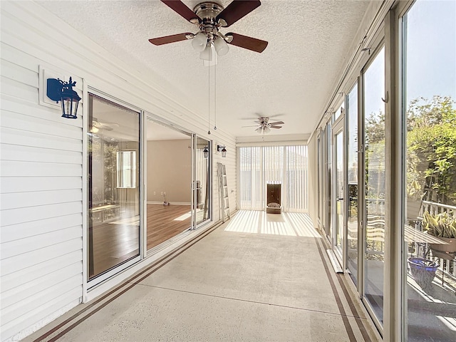 unfurnished sunroom with plenty of natural light