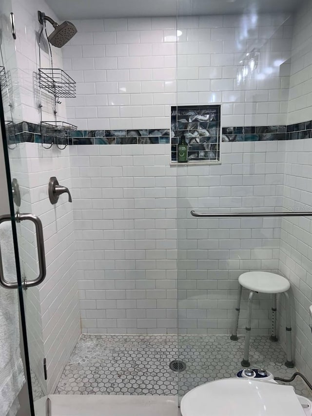 full bath featuring a stall shower