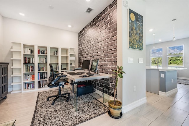 office space with baseboards, visible vents, and recessed lighting