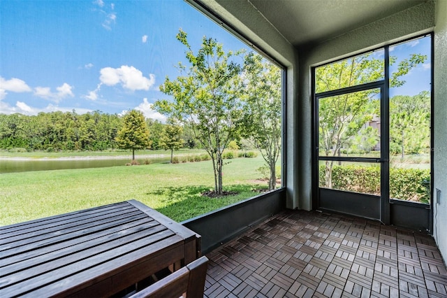 unfurnished sunroom with a wealth of natural light