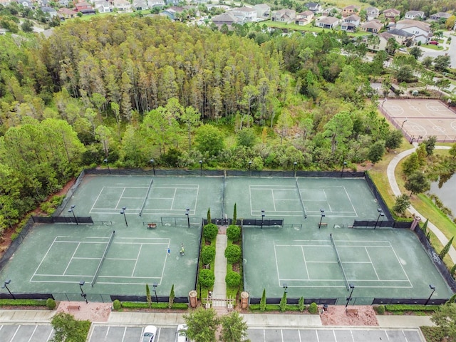 view of tennis court with fence