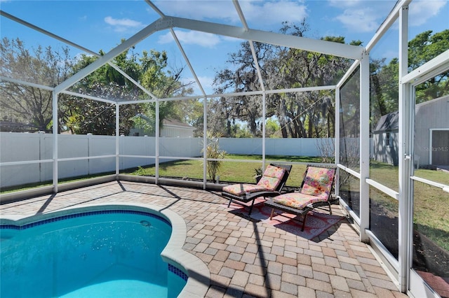 view of pool featuring a fenced in pool, a lanai, a yard, a fenced backyard, and a patio area