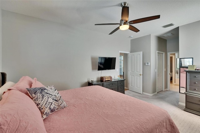 bedroom featuring a ceiling fan, light colored carpet, visible vents, and baseboards