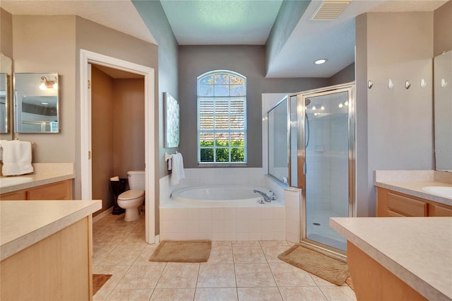 full bathroom featuring tile patterned flooring, a bath, visible vents, and a stall shower