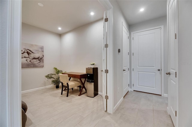 home office with baseboards and recessed lighting