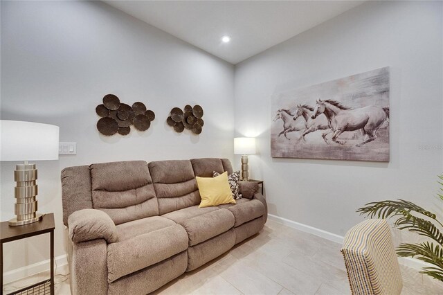 3753 Maxwell Park Dr, Sun City Center, FL 33573 - living room featuring baseboards, recessed lighting, and light tile patterned floors