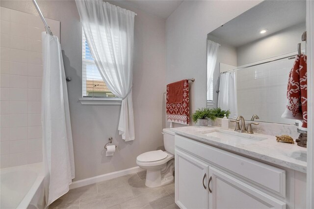 3753 Maxwell Park Dr, Sun City Center, FL 33573 - full bath with vanity, toilet, tile patterned floors, shower / tub combo, and baseboards