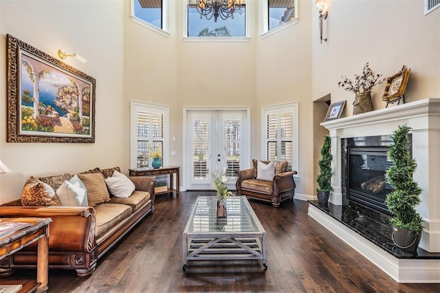 5914 Fitzgerald Rd, Odessa, FL 33556 - living area with a chandelier, healthy amount of natural light, dark wood finished floors, and a high ceiling