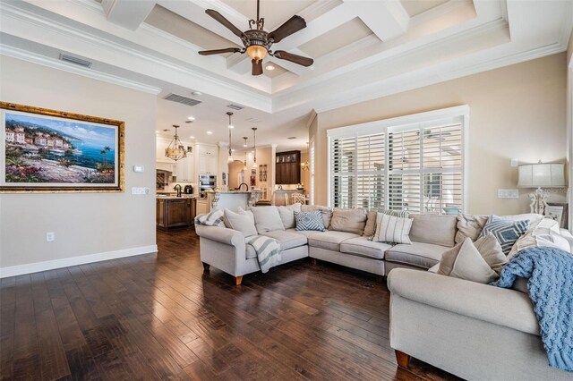 5914 Fitzgerald Rd, Odessa, FL 33556 - living area with ceiling fan, dark wood-style floors, coffered ceiling, crown molding, and beamed ceiling