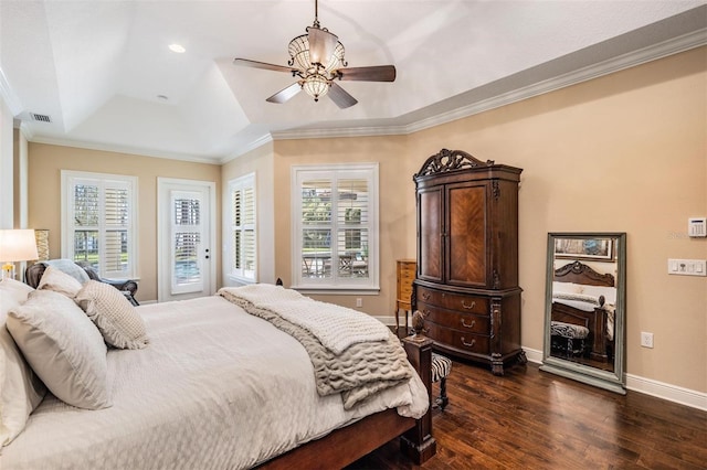 5914 Fitzgerald Rd, Odessa, FL 33556 - bedroom featuring a raised ceiling, dark wood-type flooring, multiple windows, ornamental molding, and baseboards