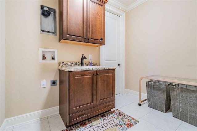 5914 Fitzgerald Rd, Odessa, FL 33556 - clothes washing area featuring cabinet space, hookup for an electric dryer, crown molding, hookup for a washing machine, and baseboards