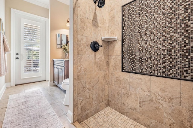 5914 Fitzgerald Rd, Odessa, FL 33556 - bathroom featuring ornamental molding, a tile shower, toilet, vanity, and baseboards
